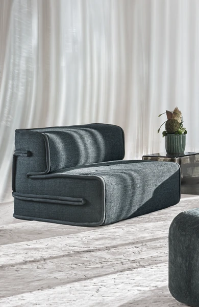 lateral view of an artistic soft armchair with waves and contrasting piping (أثاث حسب الطلب)