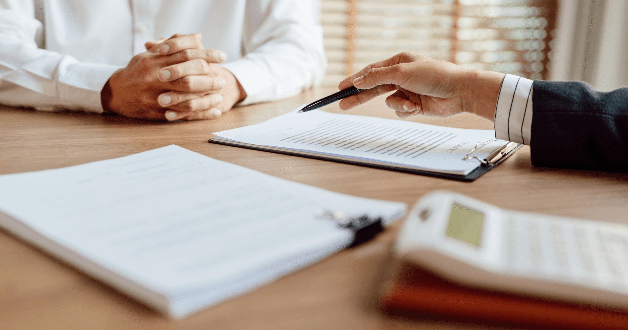 An F&B staff being briefed about his health insurance and benefits