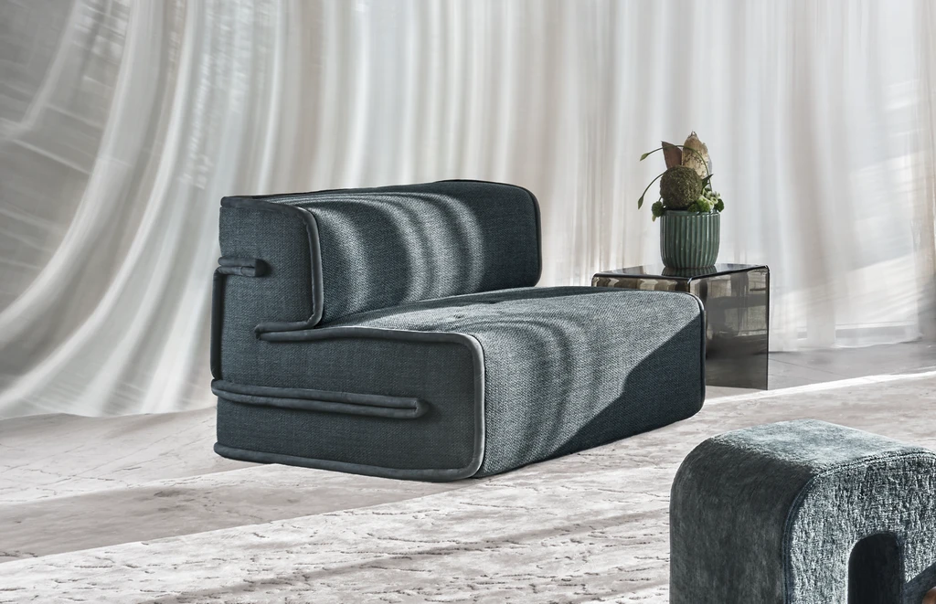 lateral view of an artistic soft armchair with waves and contrasting piping (أثاث حسب الطلب)