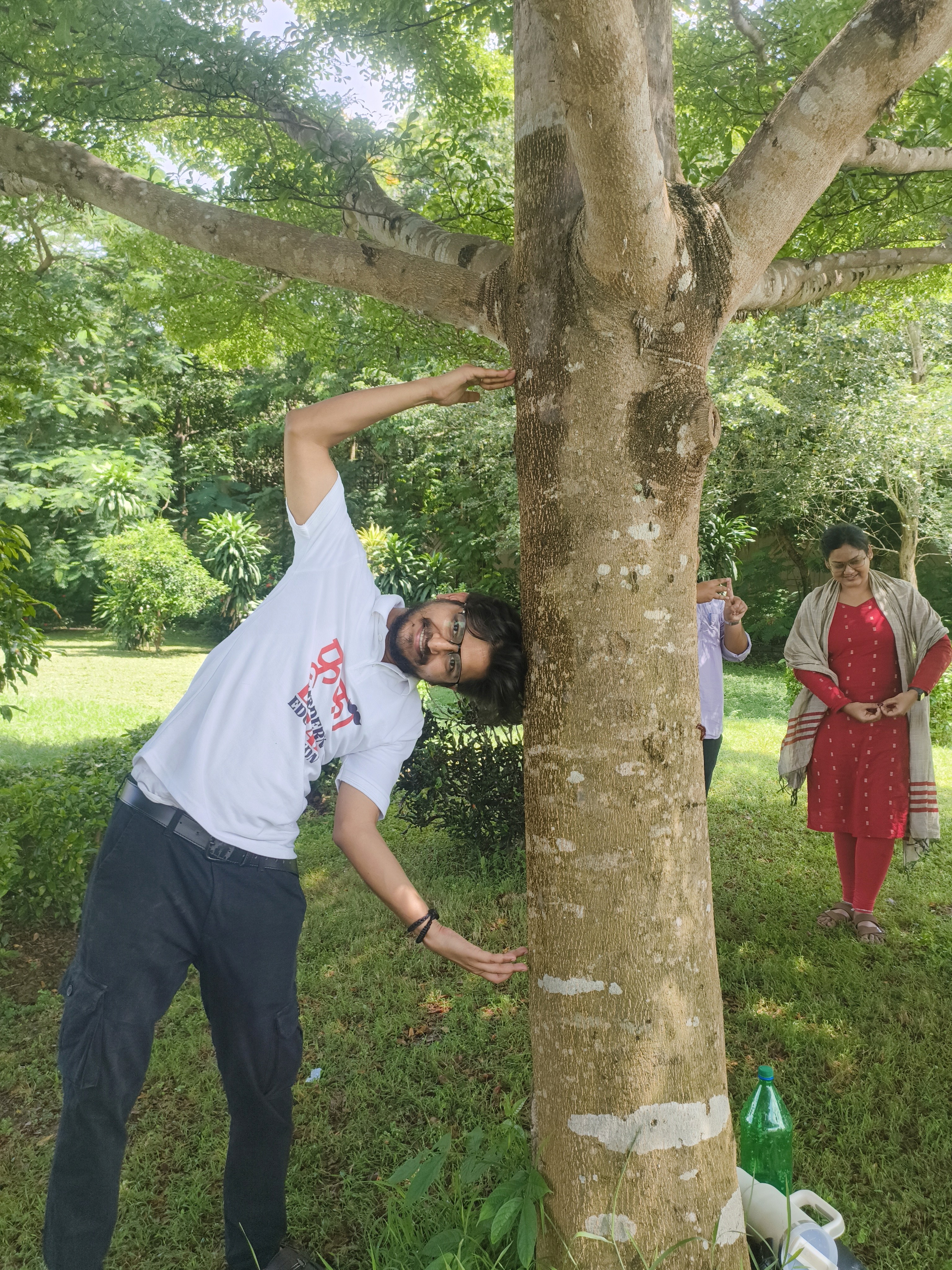 Rohit Sharma (Founder, ALL) hugging a tree sideways