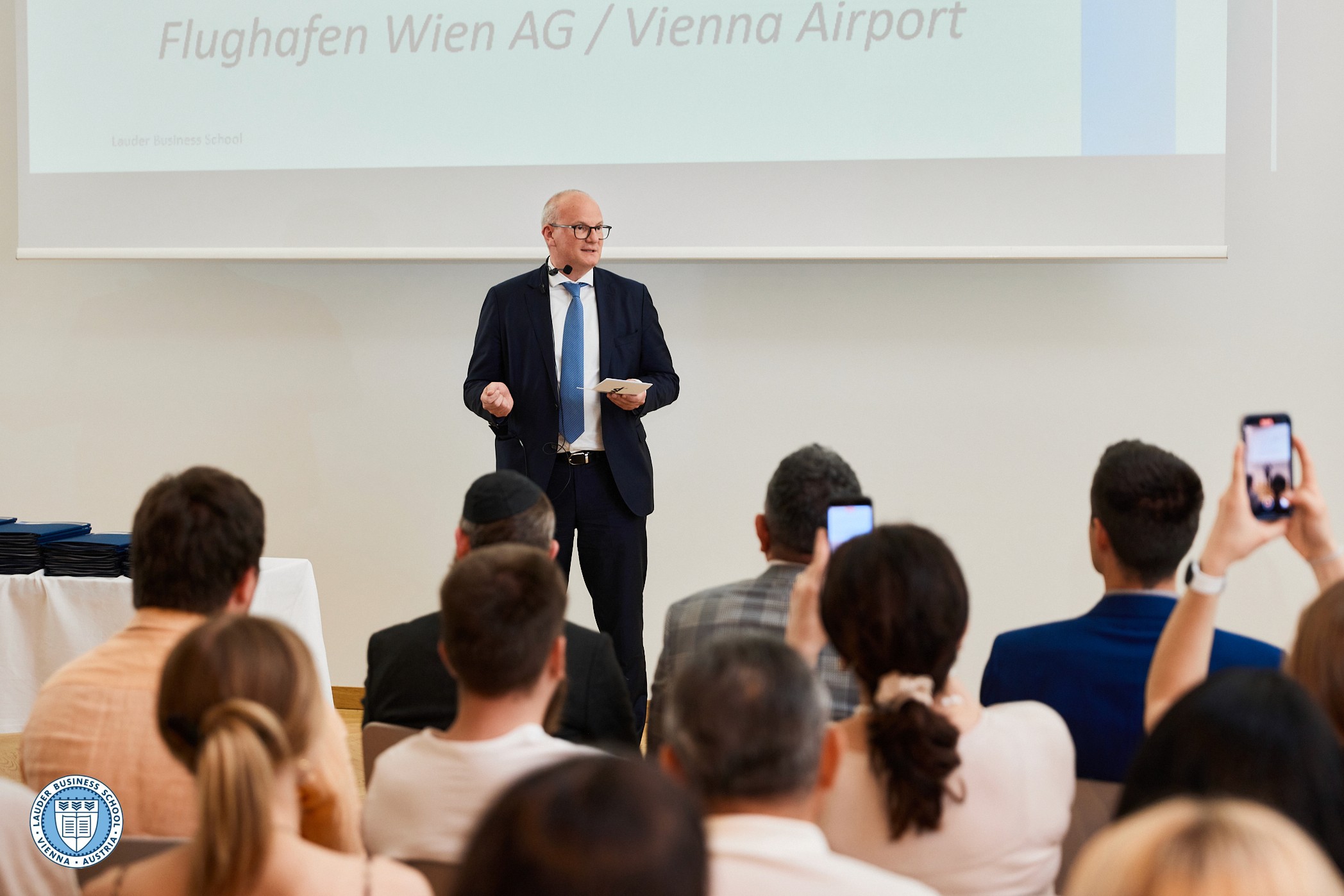 Audience seated and listening during a talk event at LBS