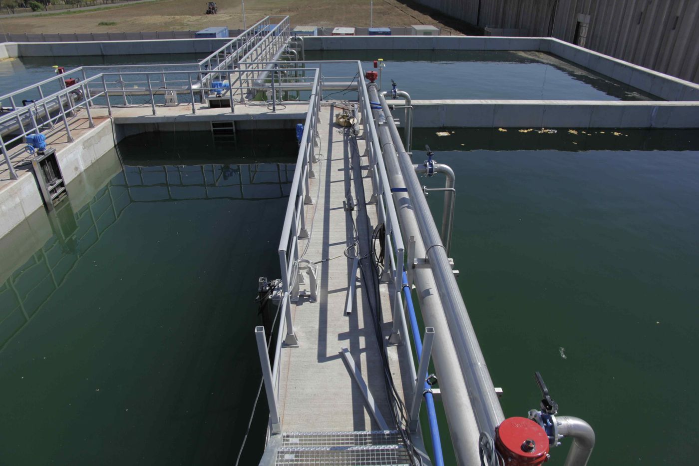 Walkway over the basins at the Bonduelle wastewater treatment plant, Békéscsaba, Hungary
