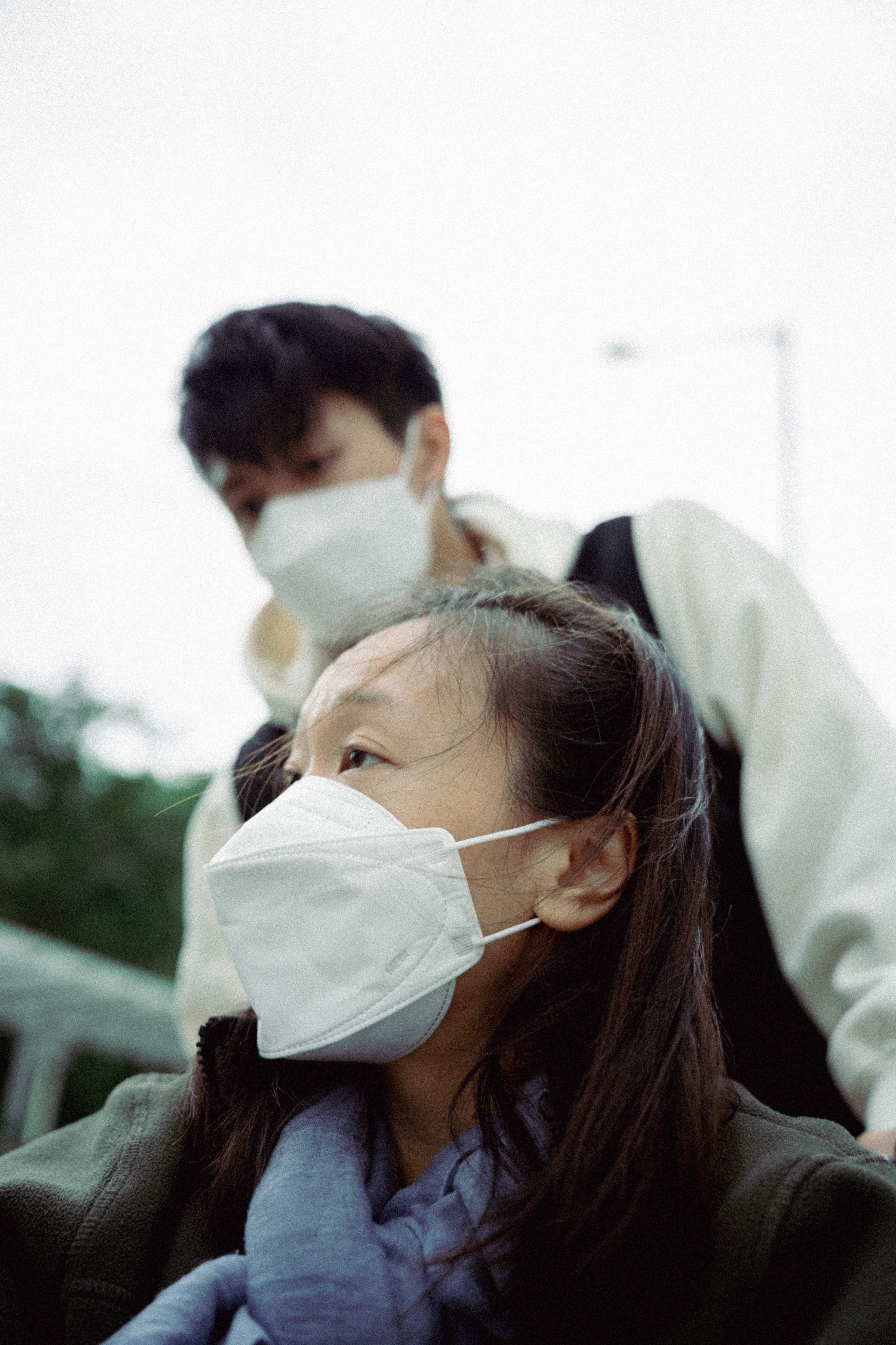 the skirts is moving by the wind that sister is wearing