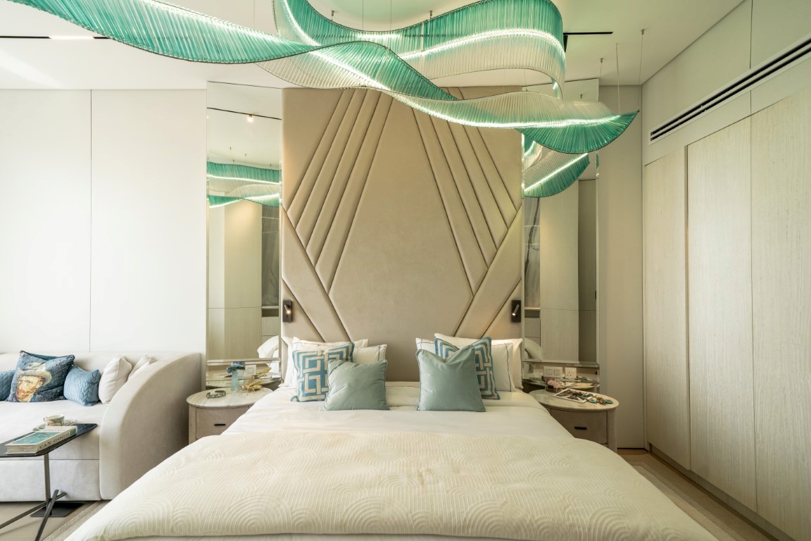 Bedroom with chandeliers