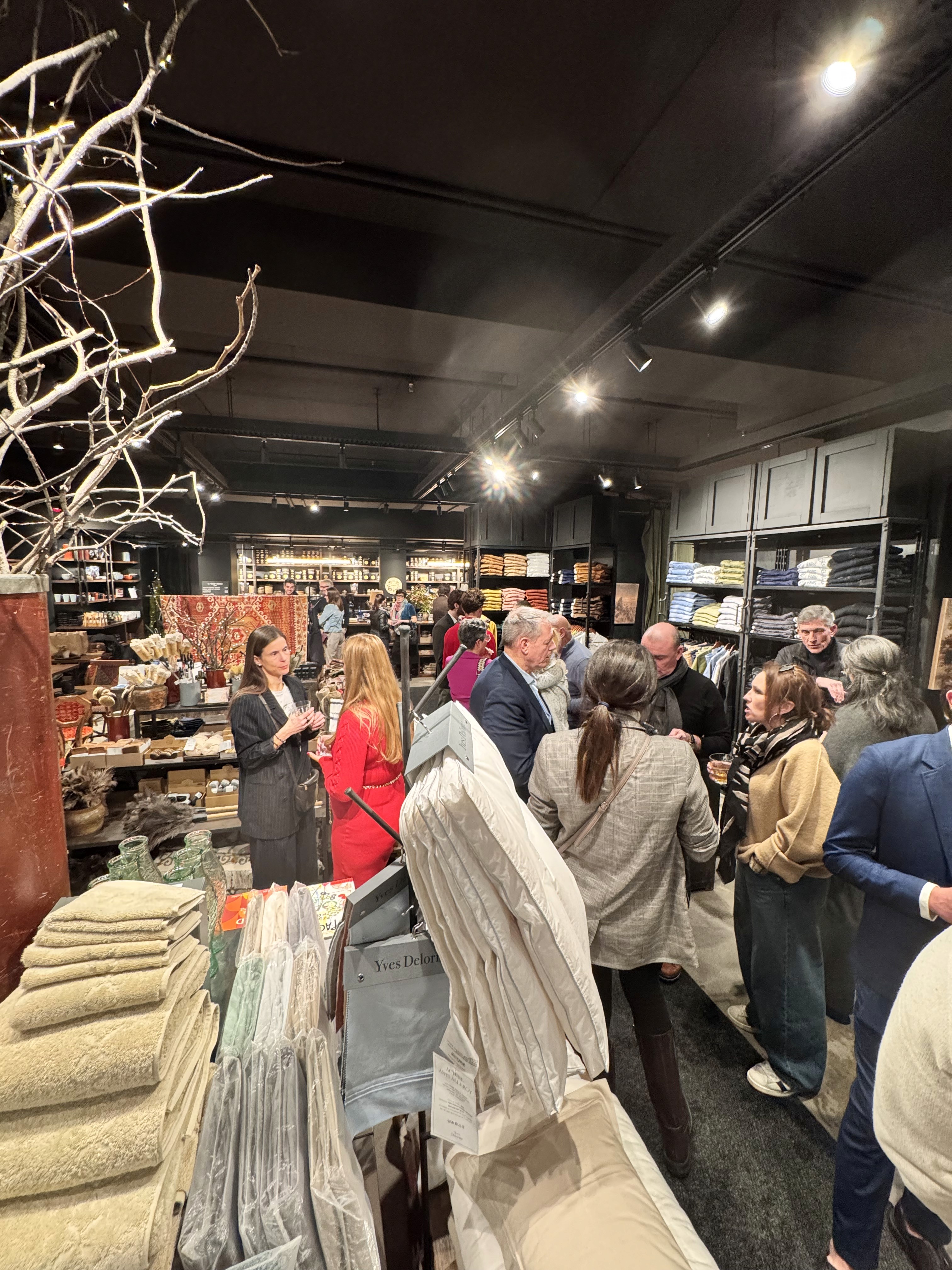 A disco ball hangs from a white ceiling.
