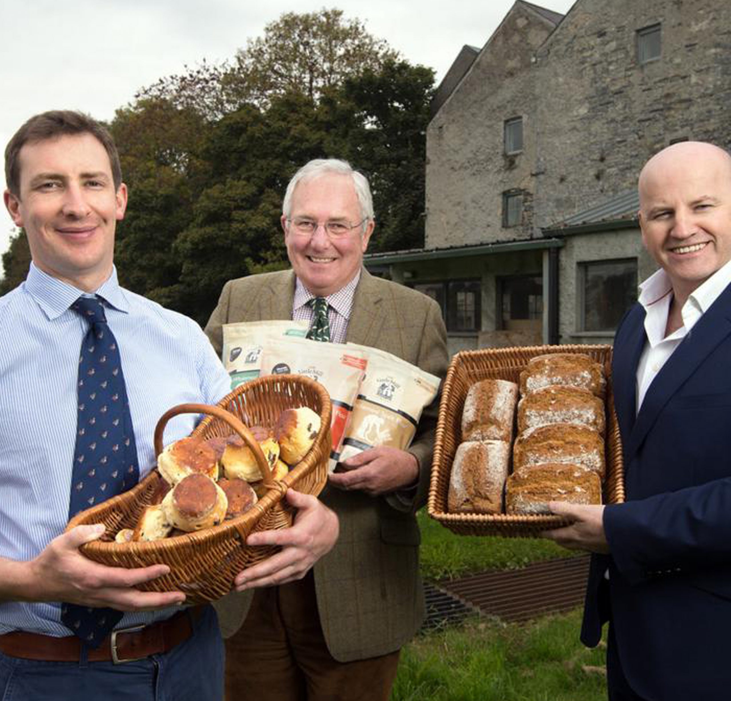 Owners of The Little Mill smiling and showing their plur while supplying it to As One Restaurant Dublin