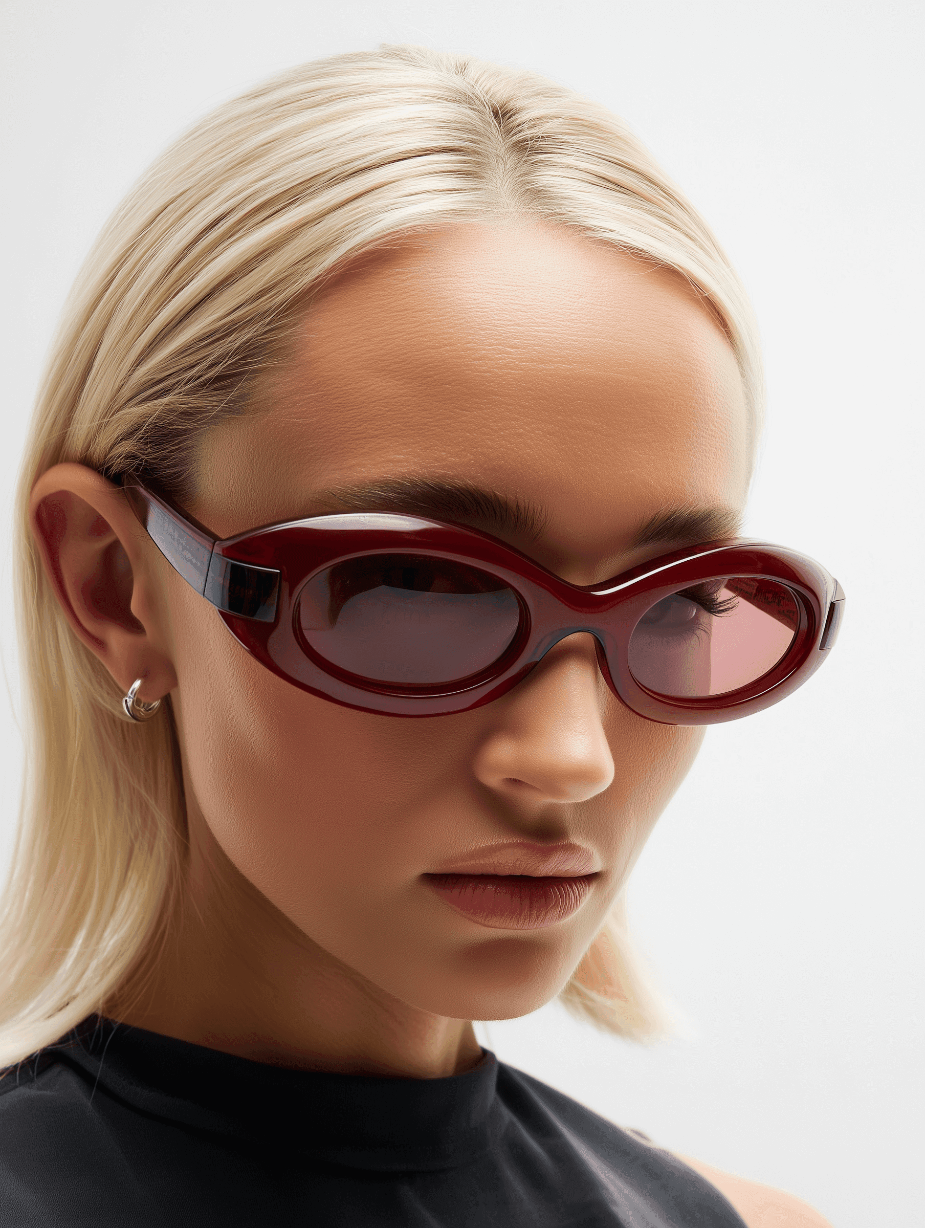 Close-up portrait with glossy red sunglasses