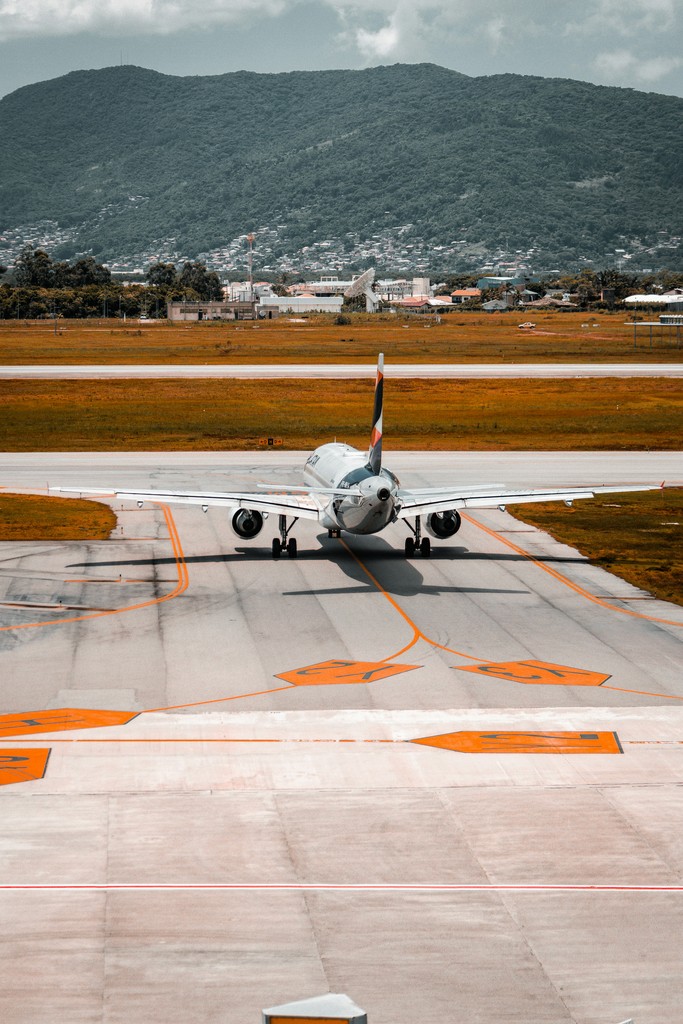 a large jetliner sitting on top of an airport tarmac