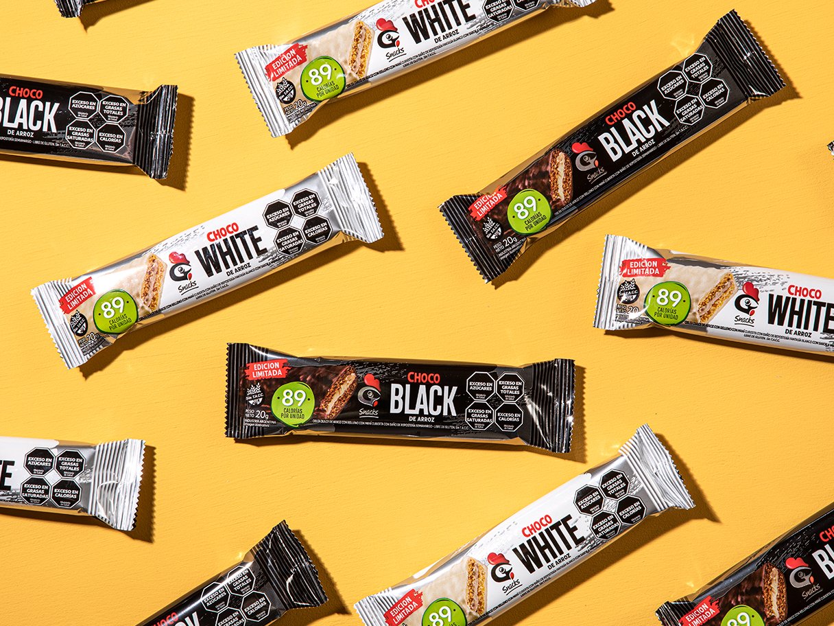 Rustic cabin in a golden field at sunset