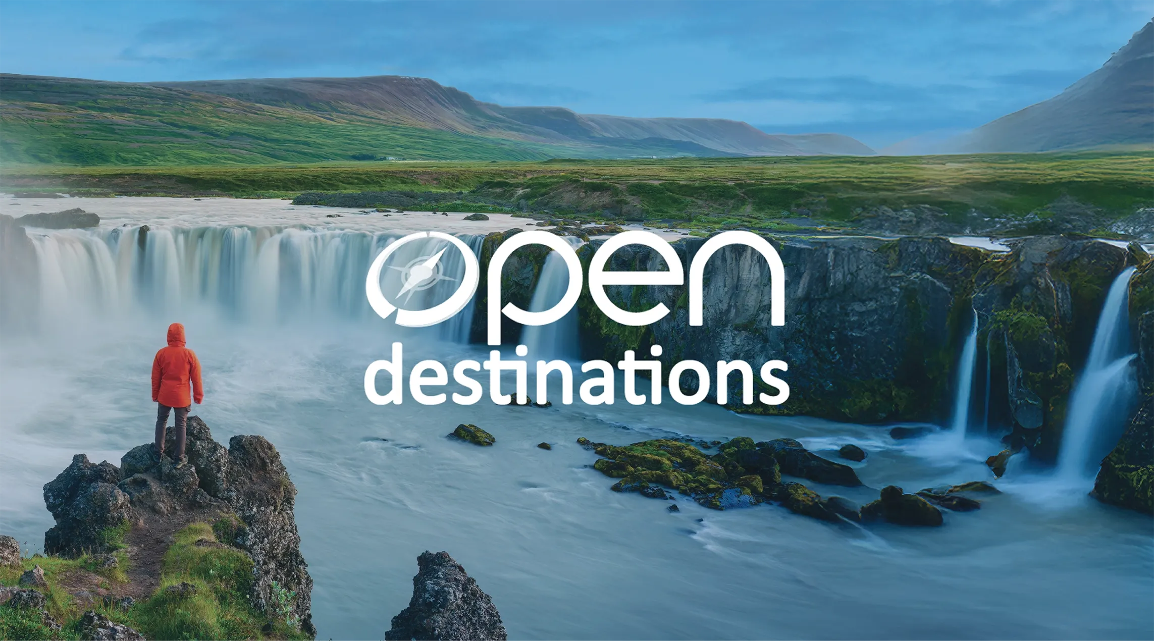 Scenic landscape with waterfalls and hills featuring the Open Destinations logo in white. The image represents travel technology and exploration.