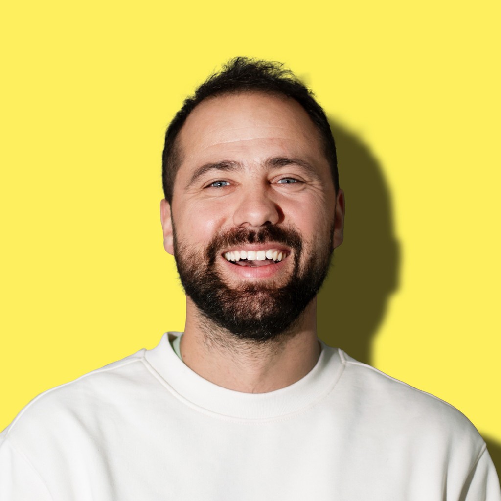 A portrait of a Vibrant employee with colorful background