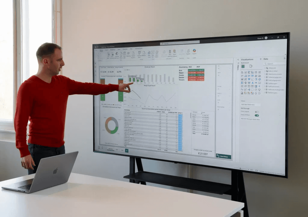 people sitting on chair in front of table