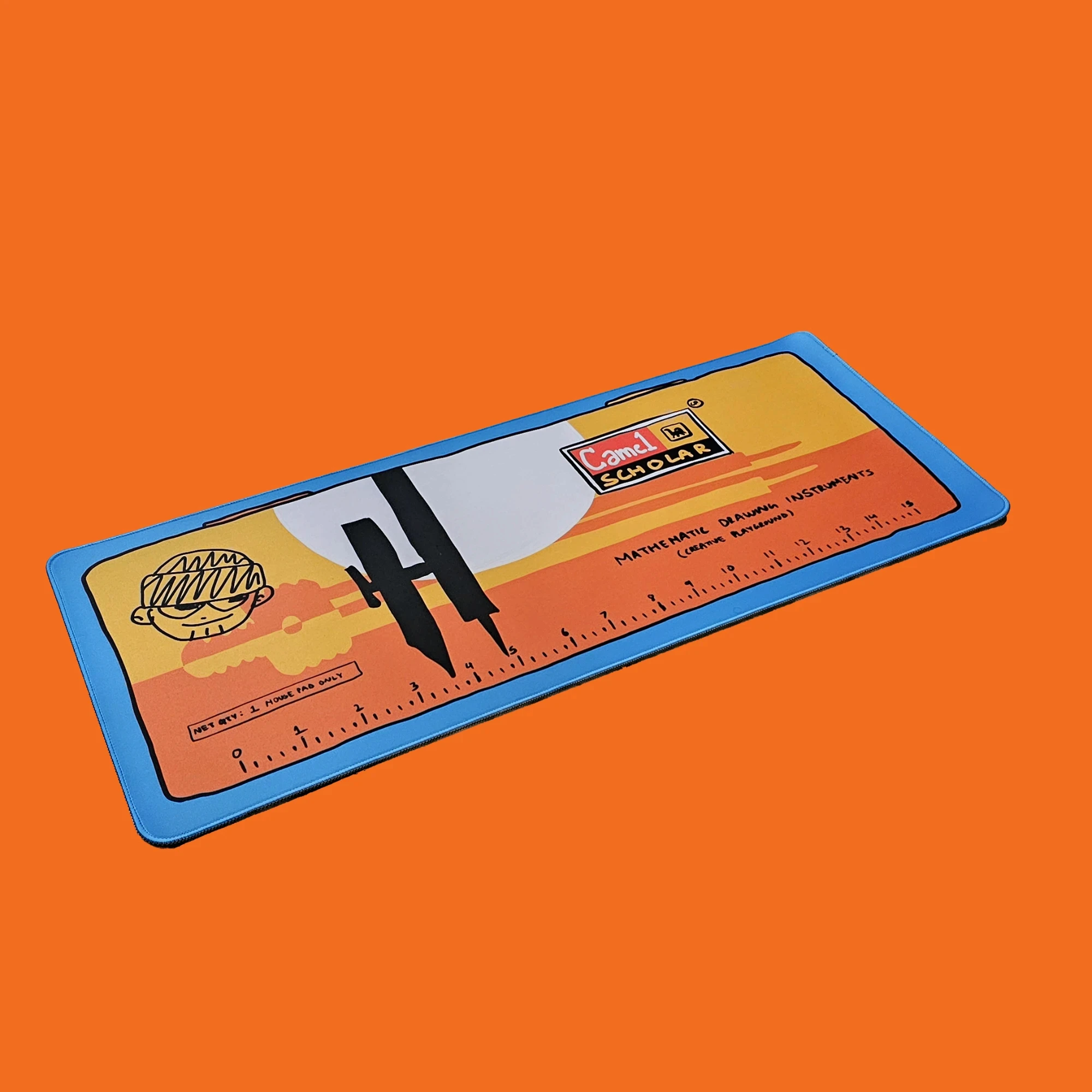 Geometry Box deskmat on an orange background