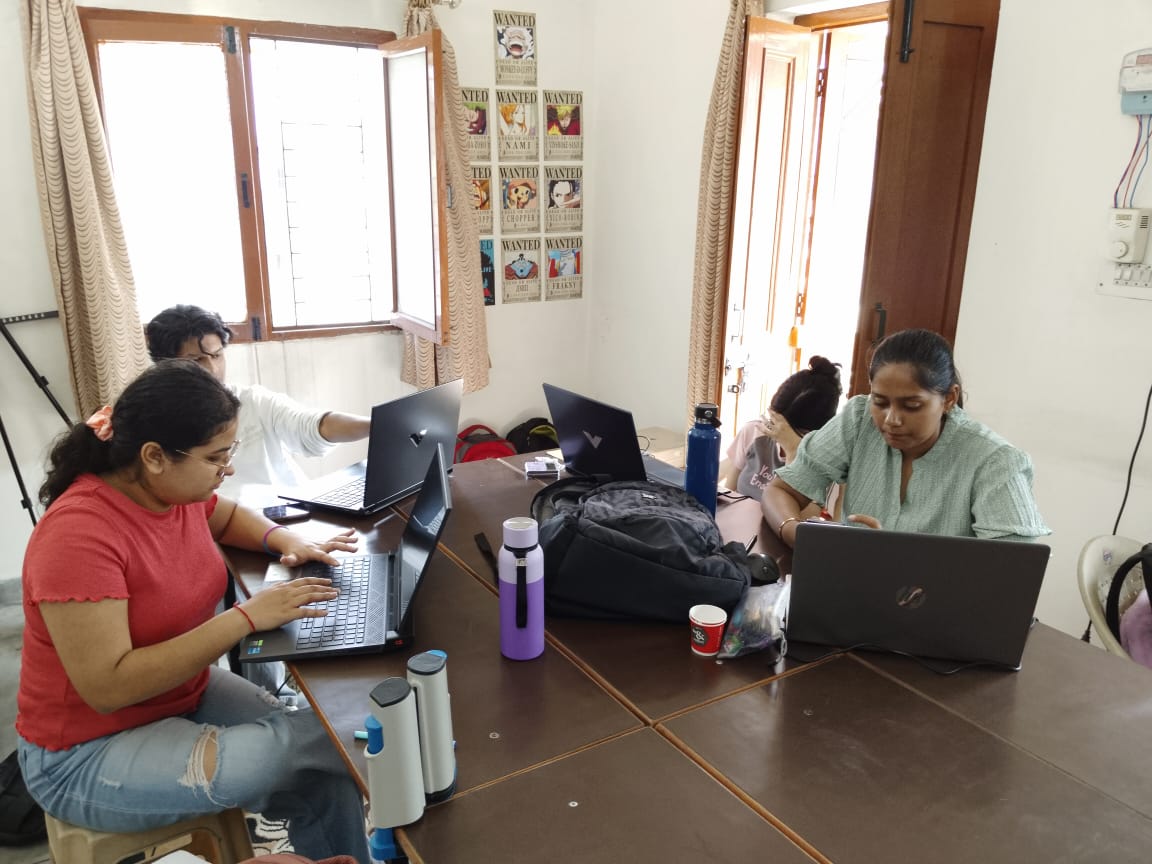 people sitting on chair in front of computer