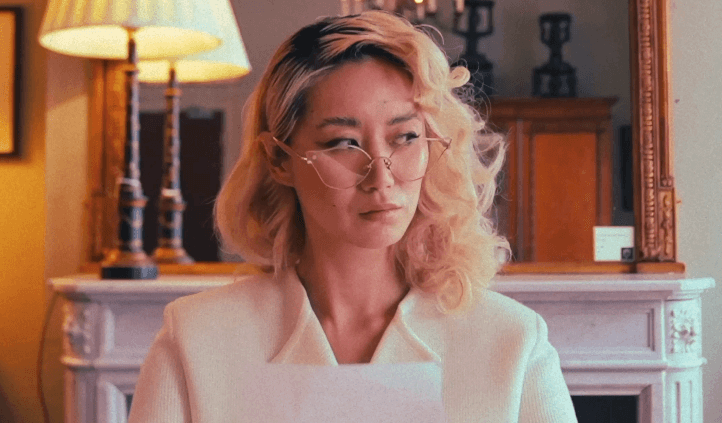 Shiba Inu dog walking on leaf-covered ground