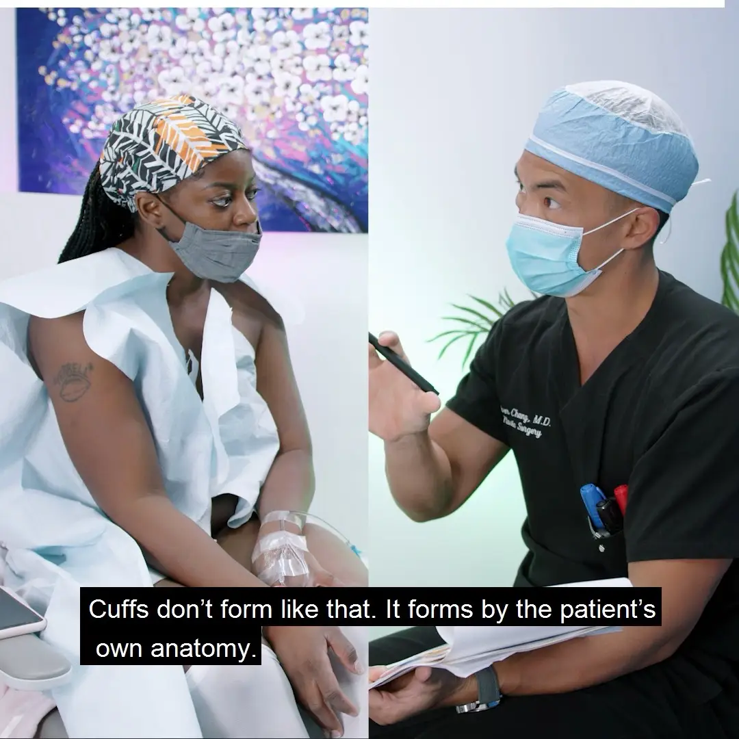 A red car zooming down the road on a foggy day