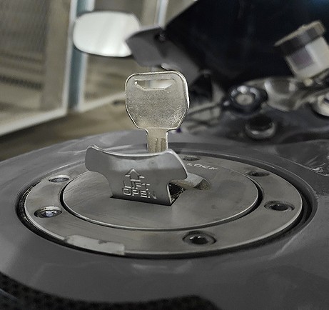 Motorcycle key replacement completed for Kawasaki by CarKeyAction in Calgary.