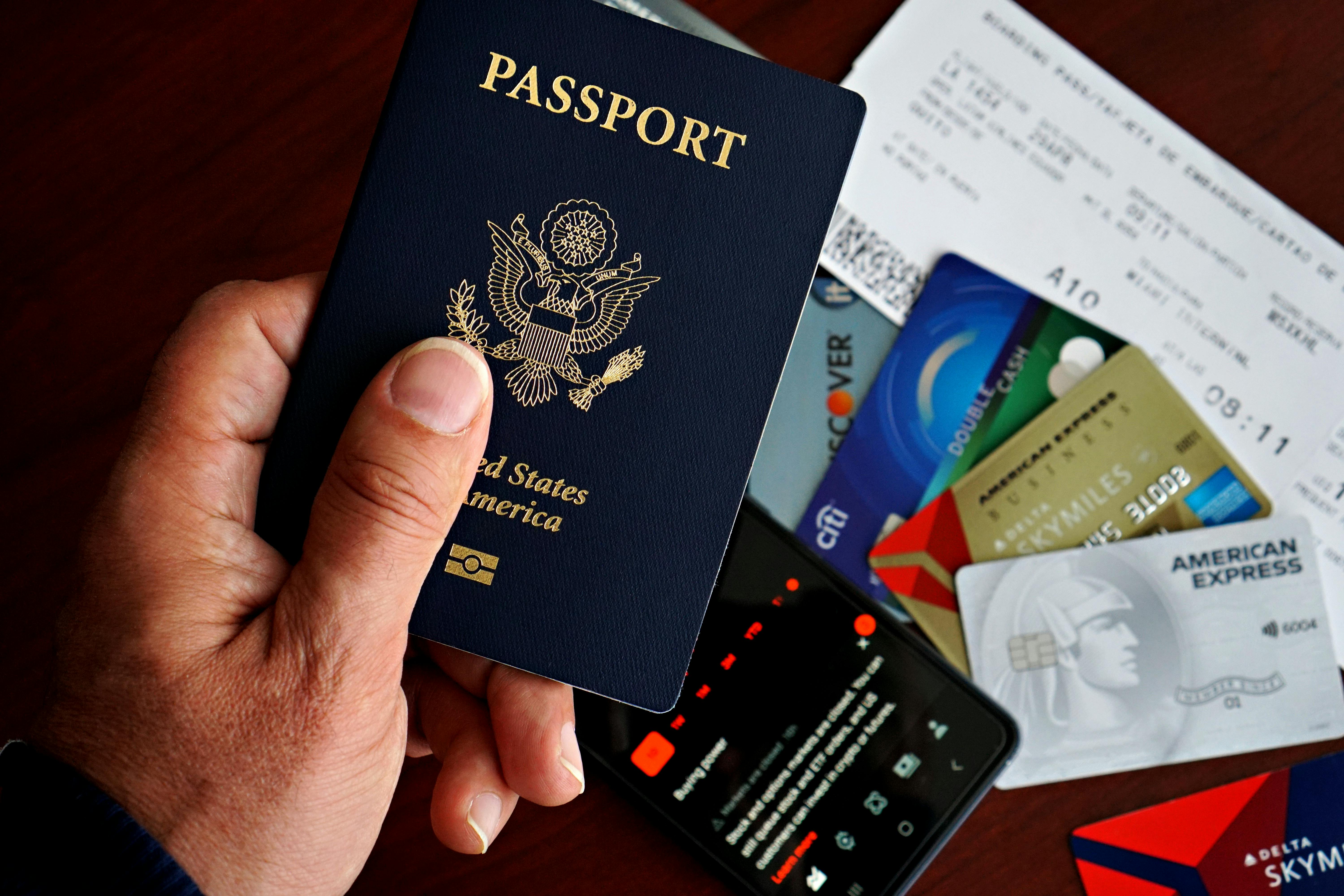 US passport and travel documents for applying for a Chinese tourist visa