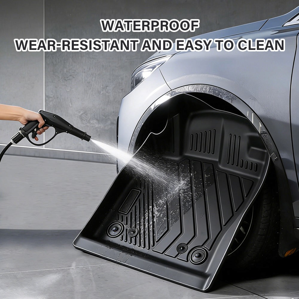 Black waterproof TPE car floor mat with deep channels and raised grip dimples