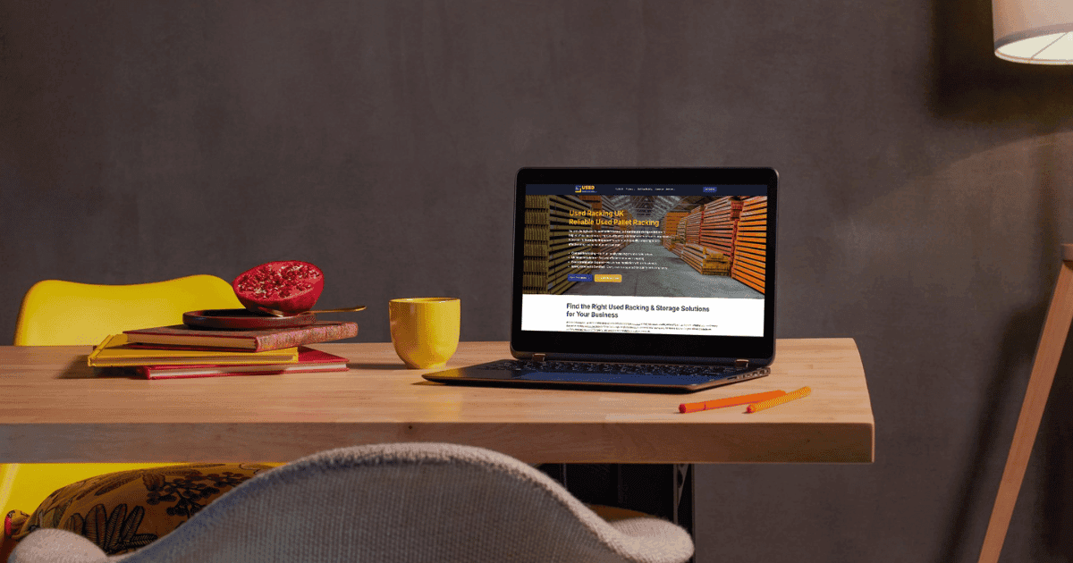 A laptop on a desk with the Used Racking UK website on the screen which was designed and developed by Nimble Media Digital