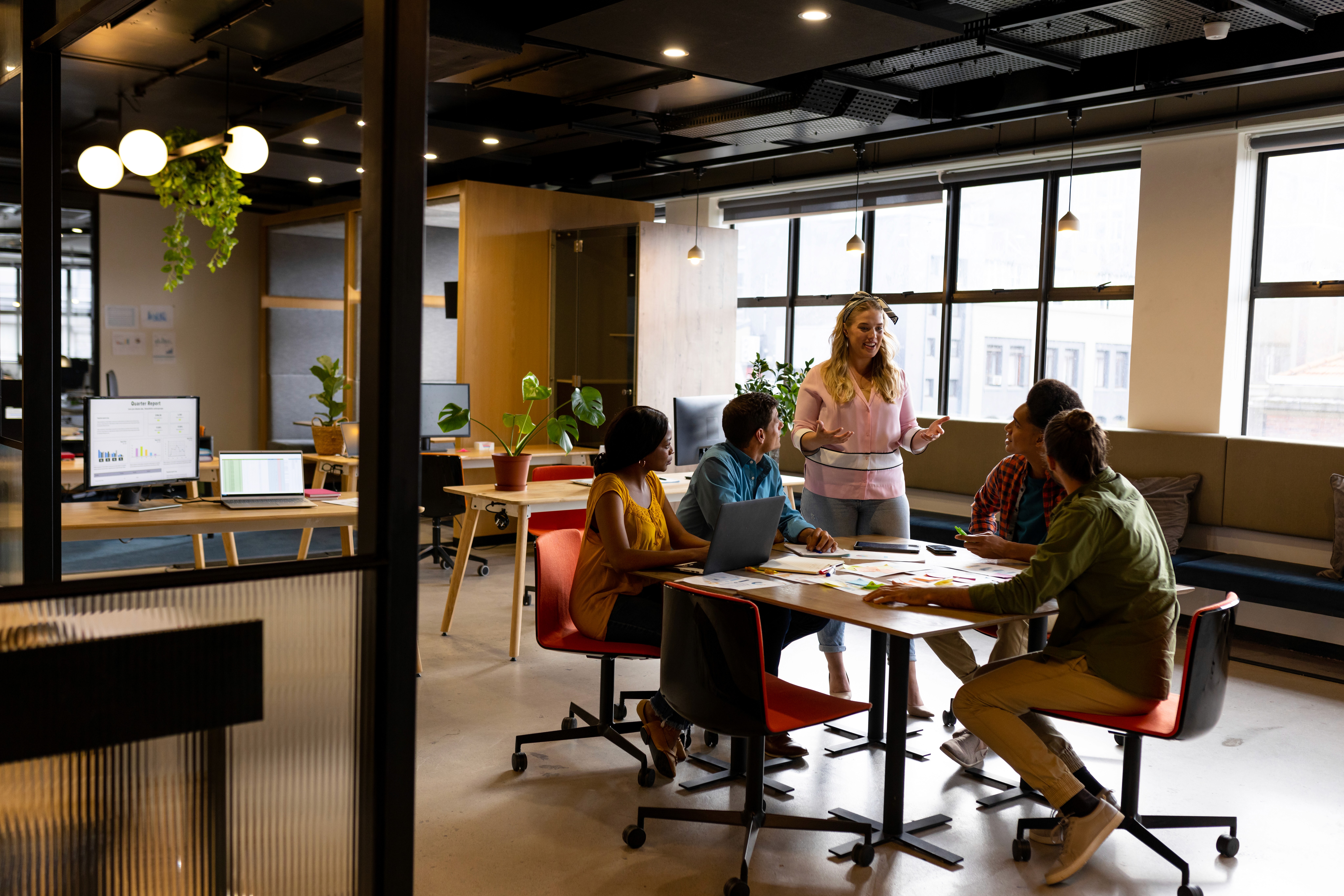 happy woman working on laptop and smiling