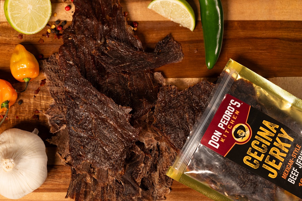 Beef jerky food packaging photography with peppers and spices