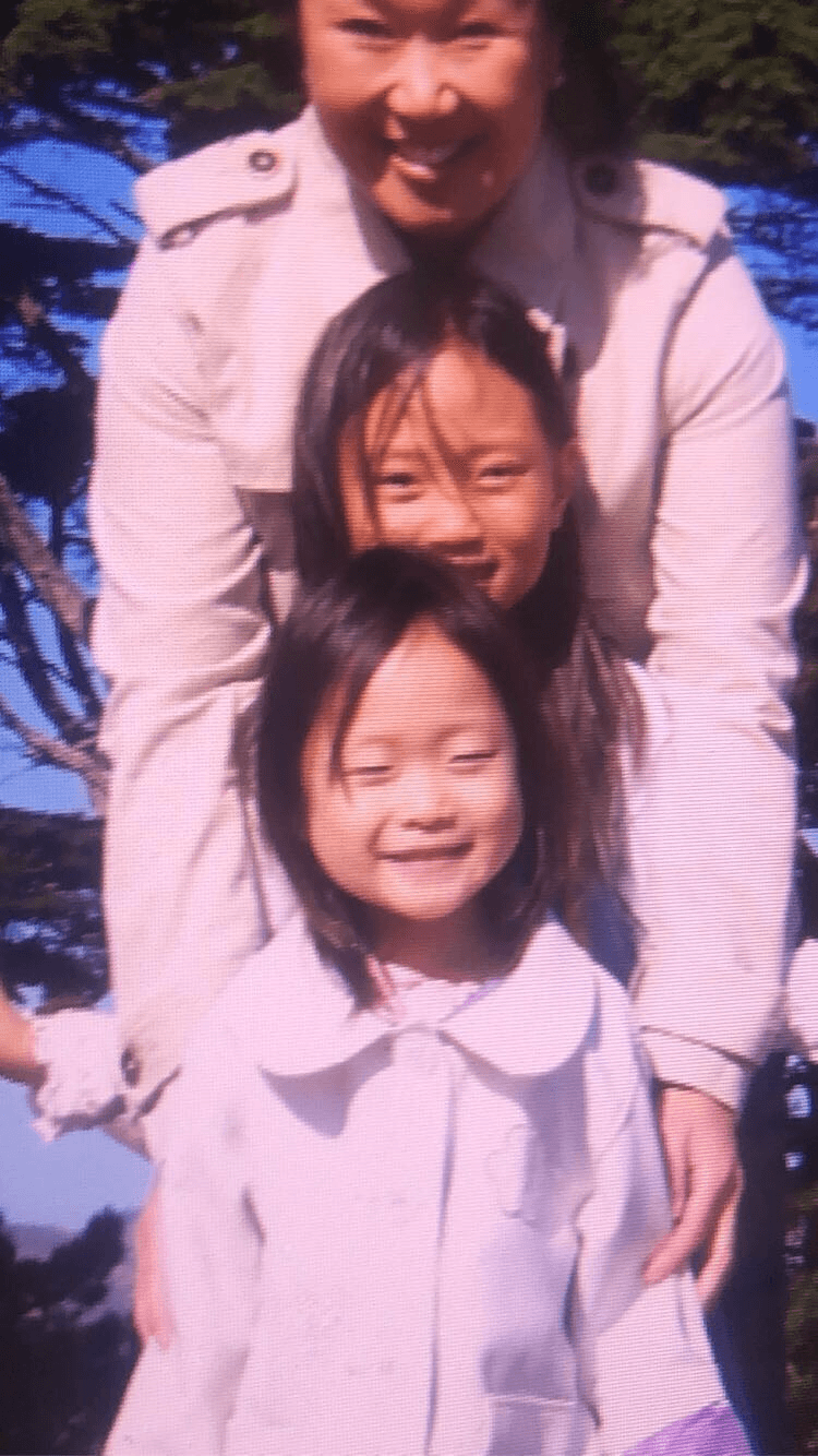 my aunt at the top, my older sister in the middle, and, you guessed it, my shining self at the bottom.