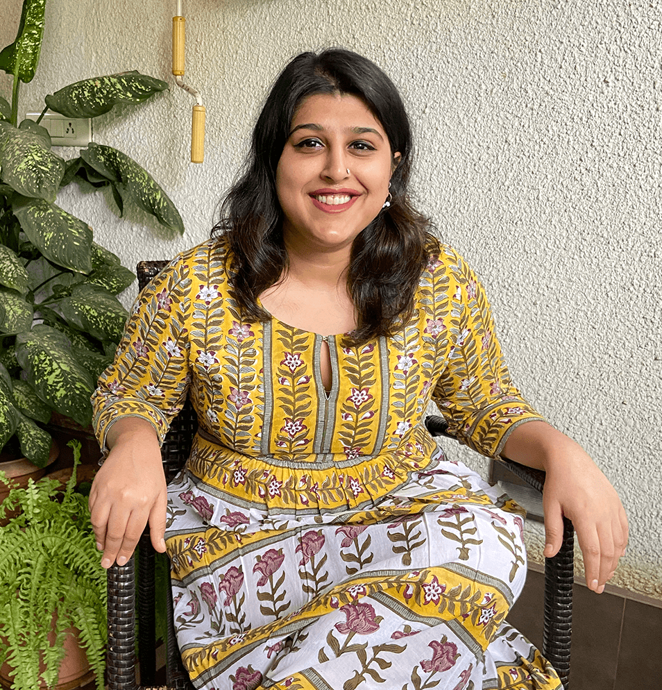 indian woman seated on chair