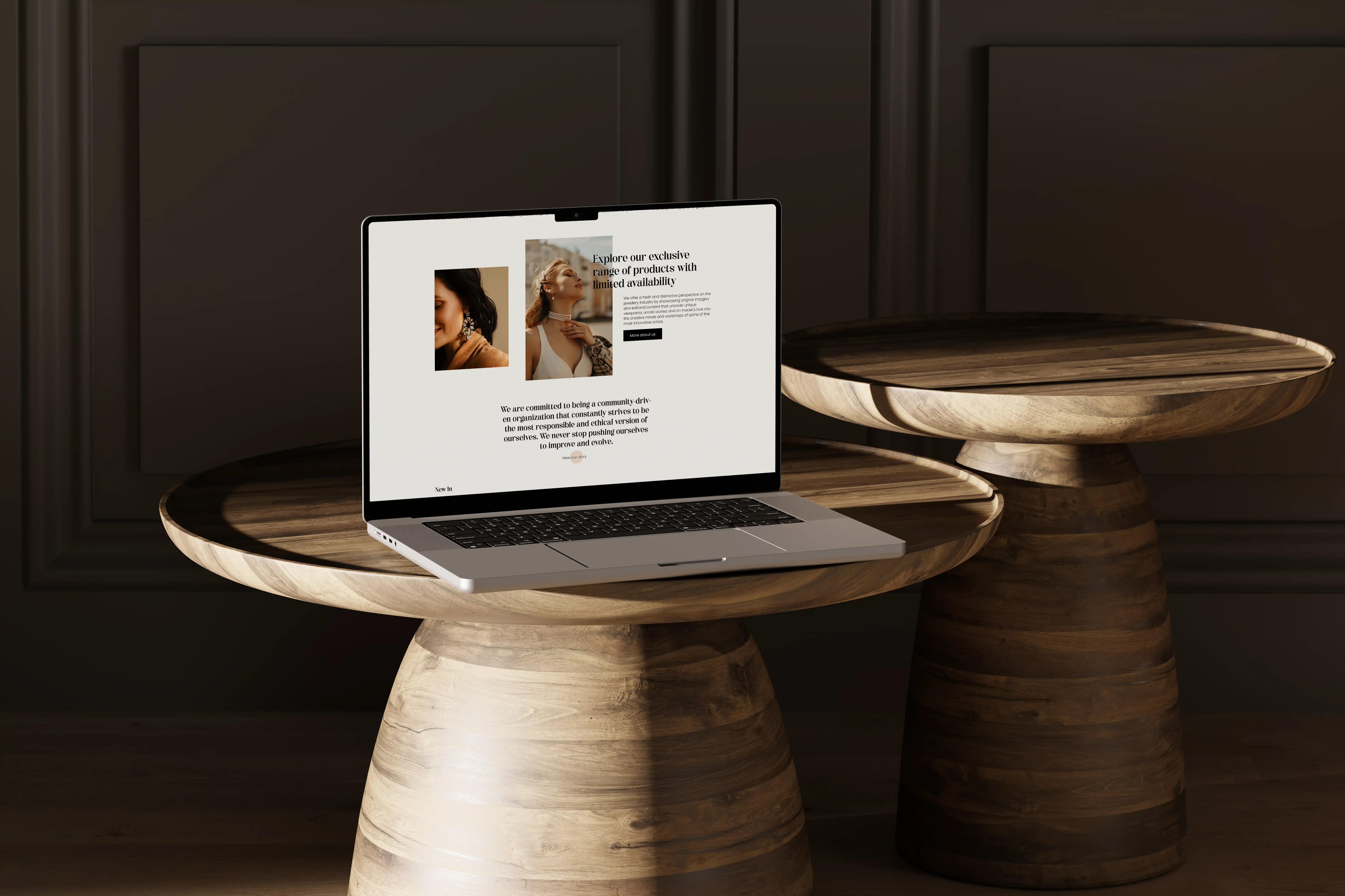 Laptop on top of round wooden table