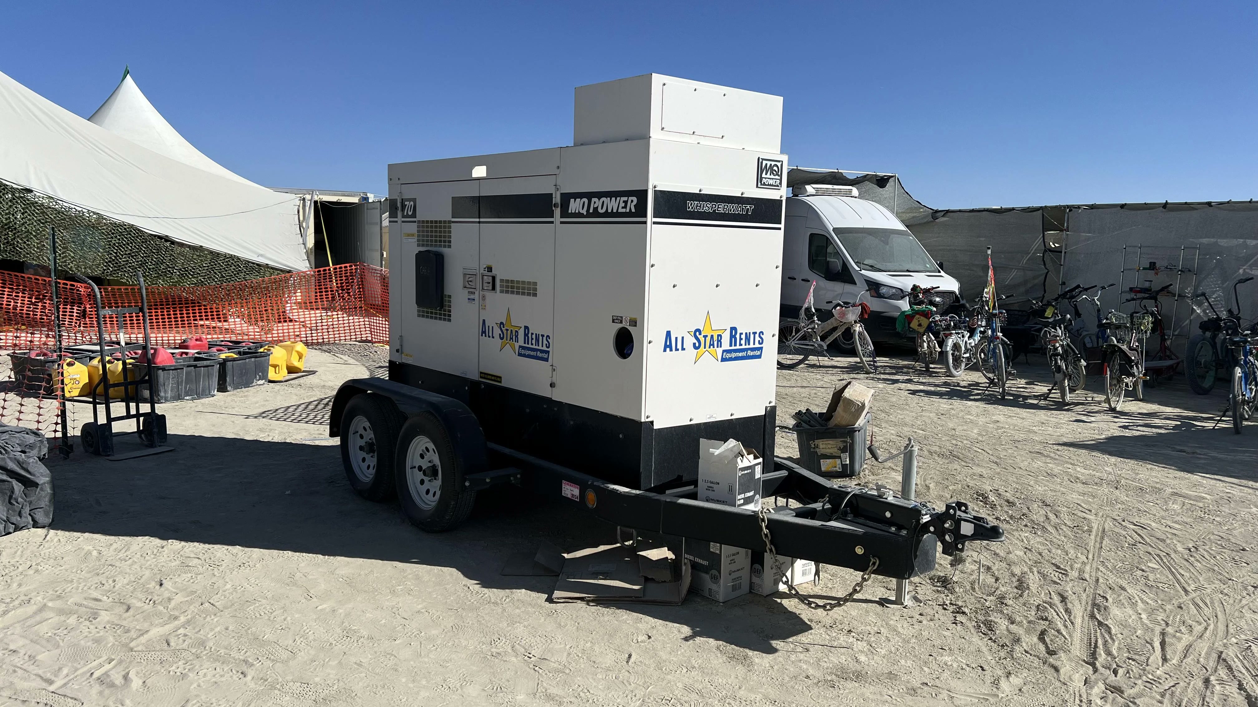 Portable generator trailer providing electricity at a desert camp