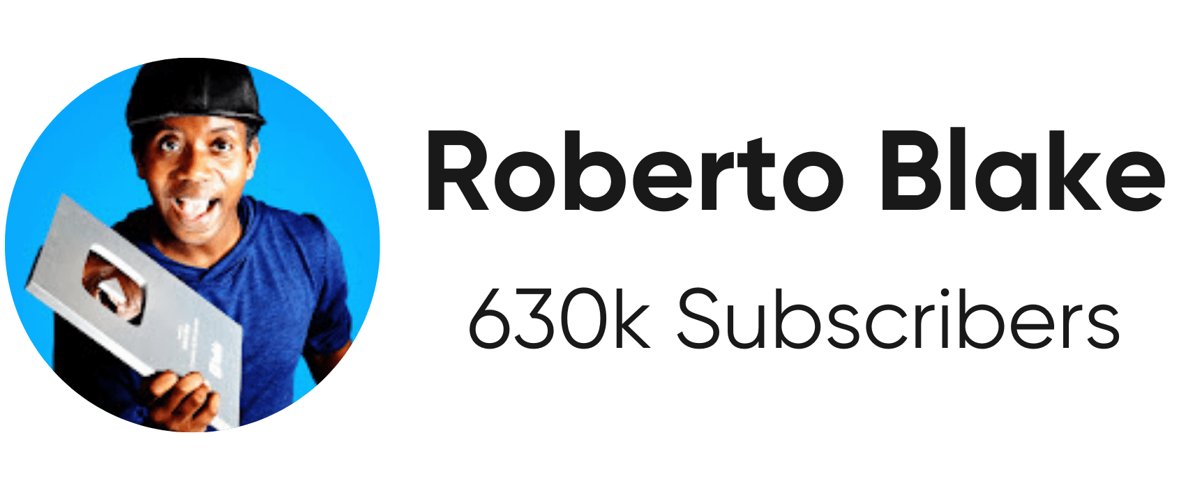 A close-up of the YouTube creator "Roberto Blake." It shows a circular profile picture with a headshot of a man with short dark hair, wearing a blue shirt and holding a silver YouTube Play Button award. He has an excited expression on his face. The profile picture has a bright blue background. To the right of the profile picture is the text "Roberto Blake" and "630k Subscribers." The image has a light gray background.