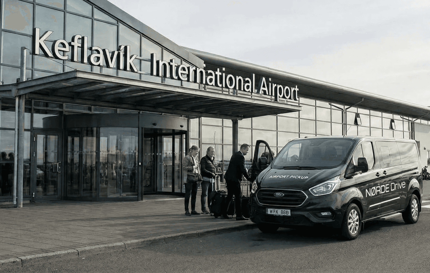 white and black airplane in mid air during daytime