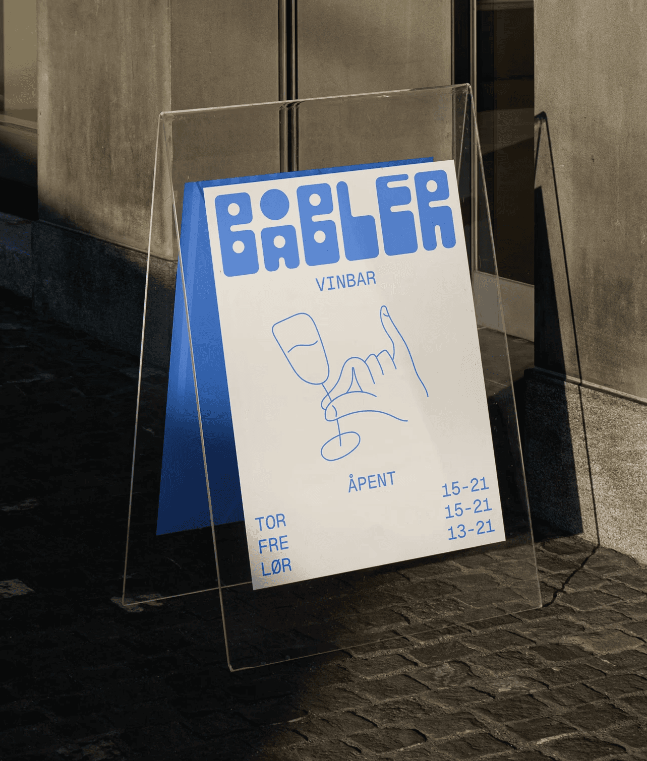 A standing sign designed for Båbler wine bar featuring it's logo, an illustration and info.