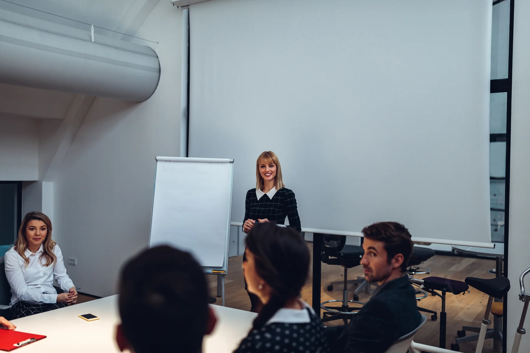 Business Presentation in Bright Modern Conference Room