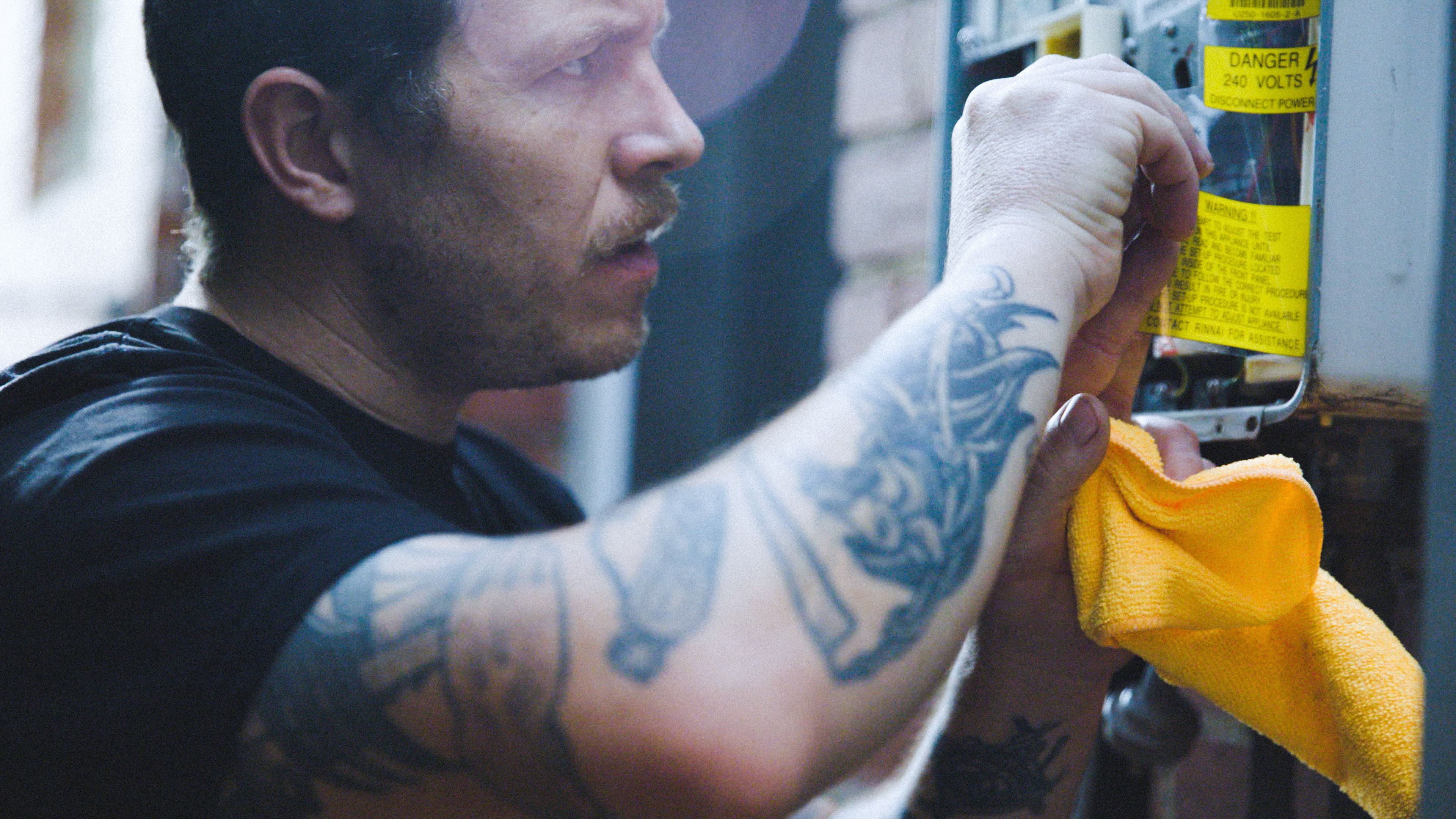 Good Maintenance Tecnician fixing electrical fuse box