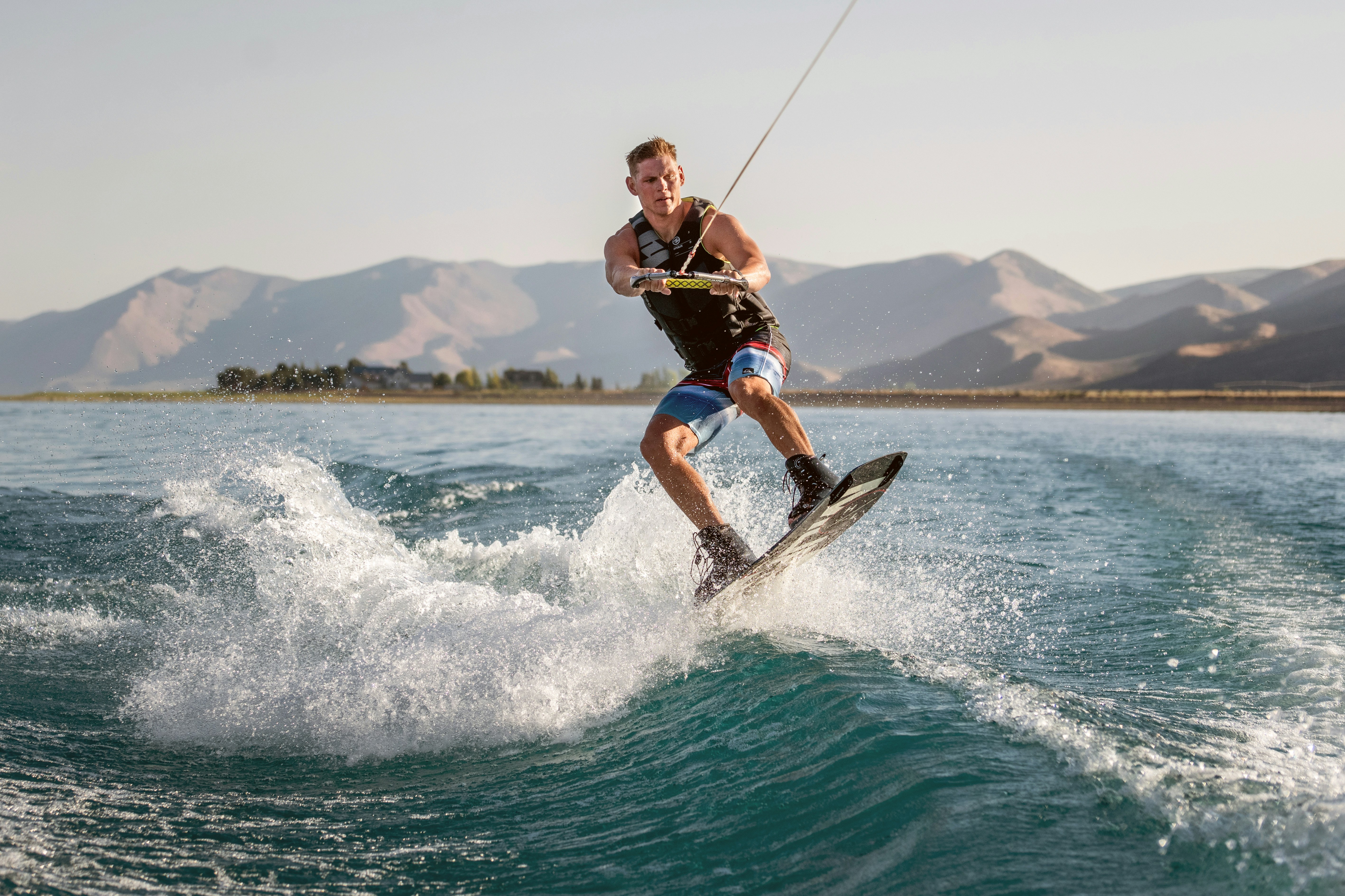 a man kite surfing on the sea