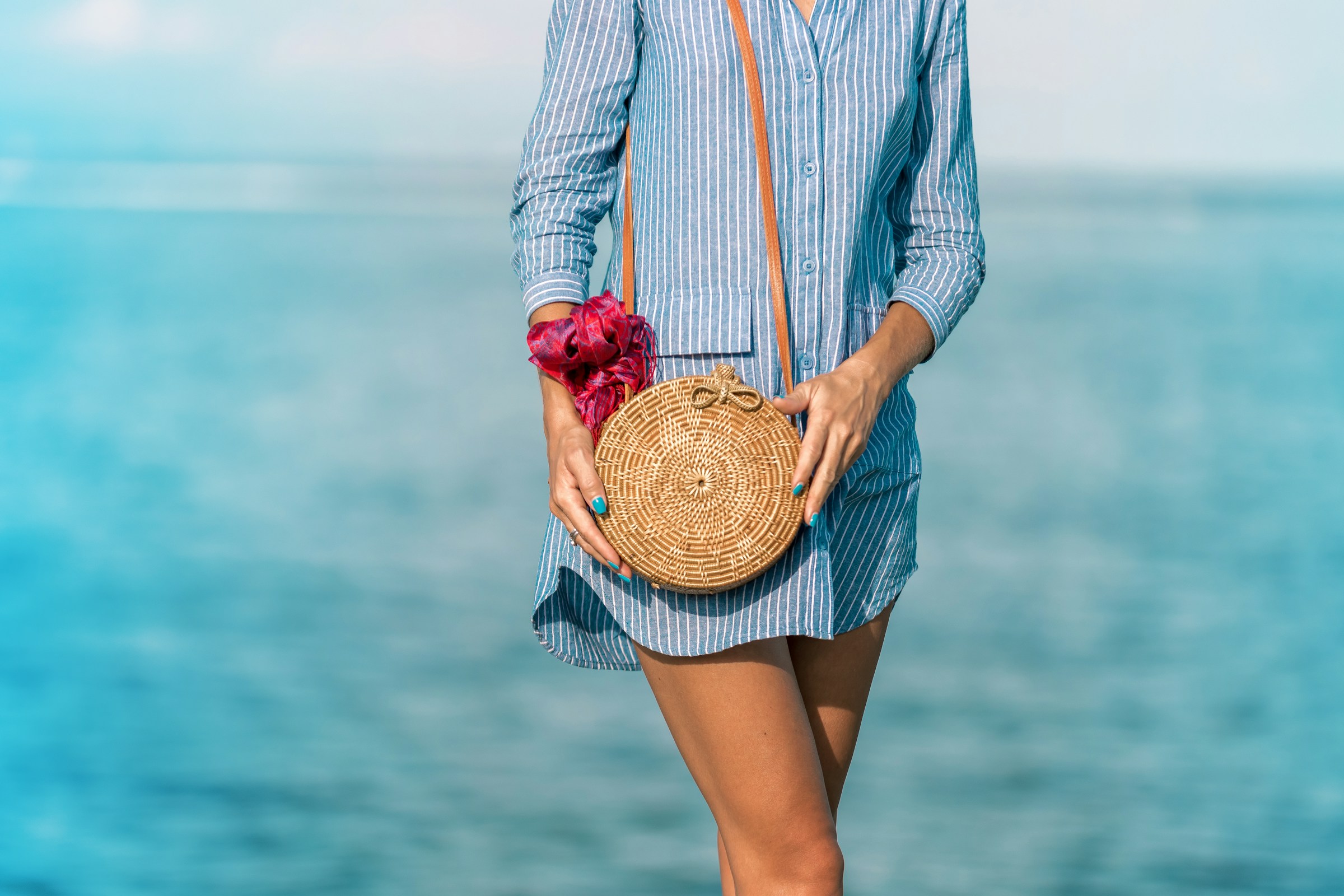 woman with a small bag - Colors That Go with Navy Blue