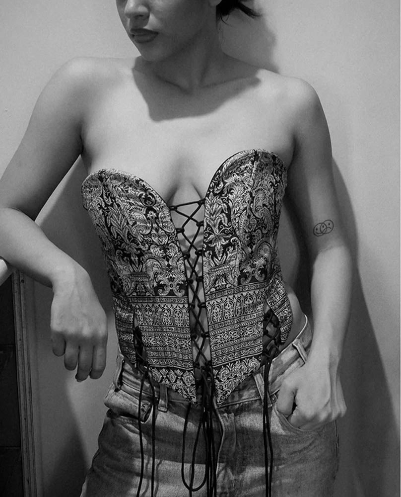 SWARA handcrafted corset made from vintage silk saree with sweetheart neckline, tapered waist, and adjustable back ties for structure and comfort.