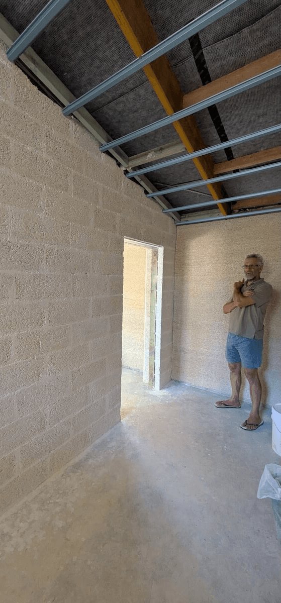 A review of a customer looking at a hemp block wall in their beautiful new hemp house