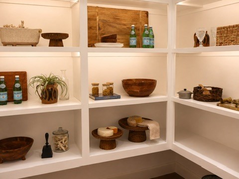 Arcwood kitchen with black island and natural light