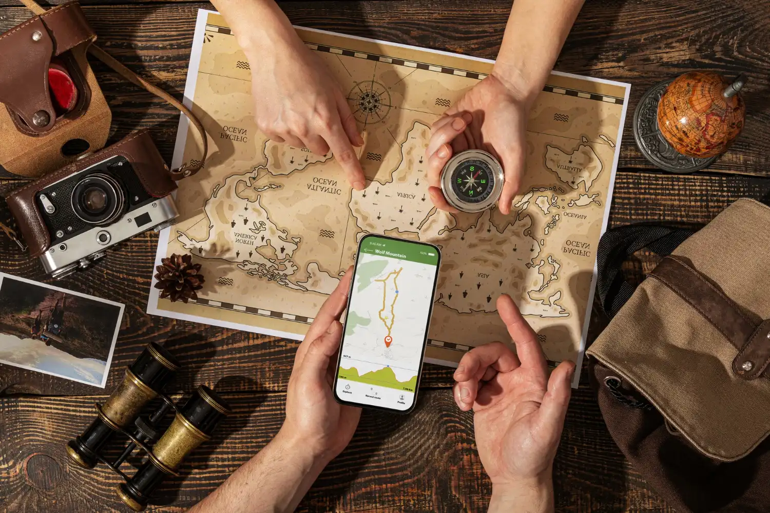 Planning international travel with map, compass.