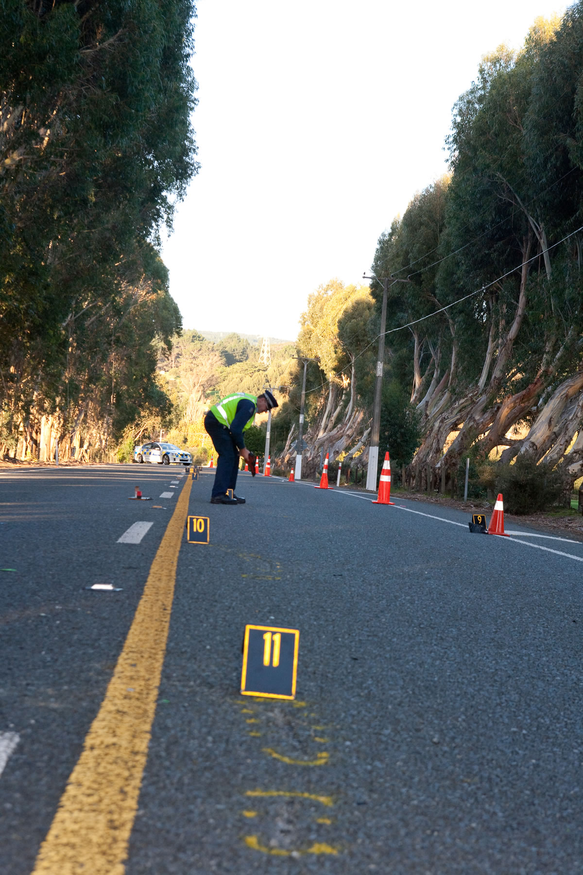 a statue of a woman holding a bird in her hand