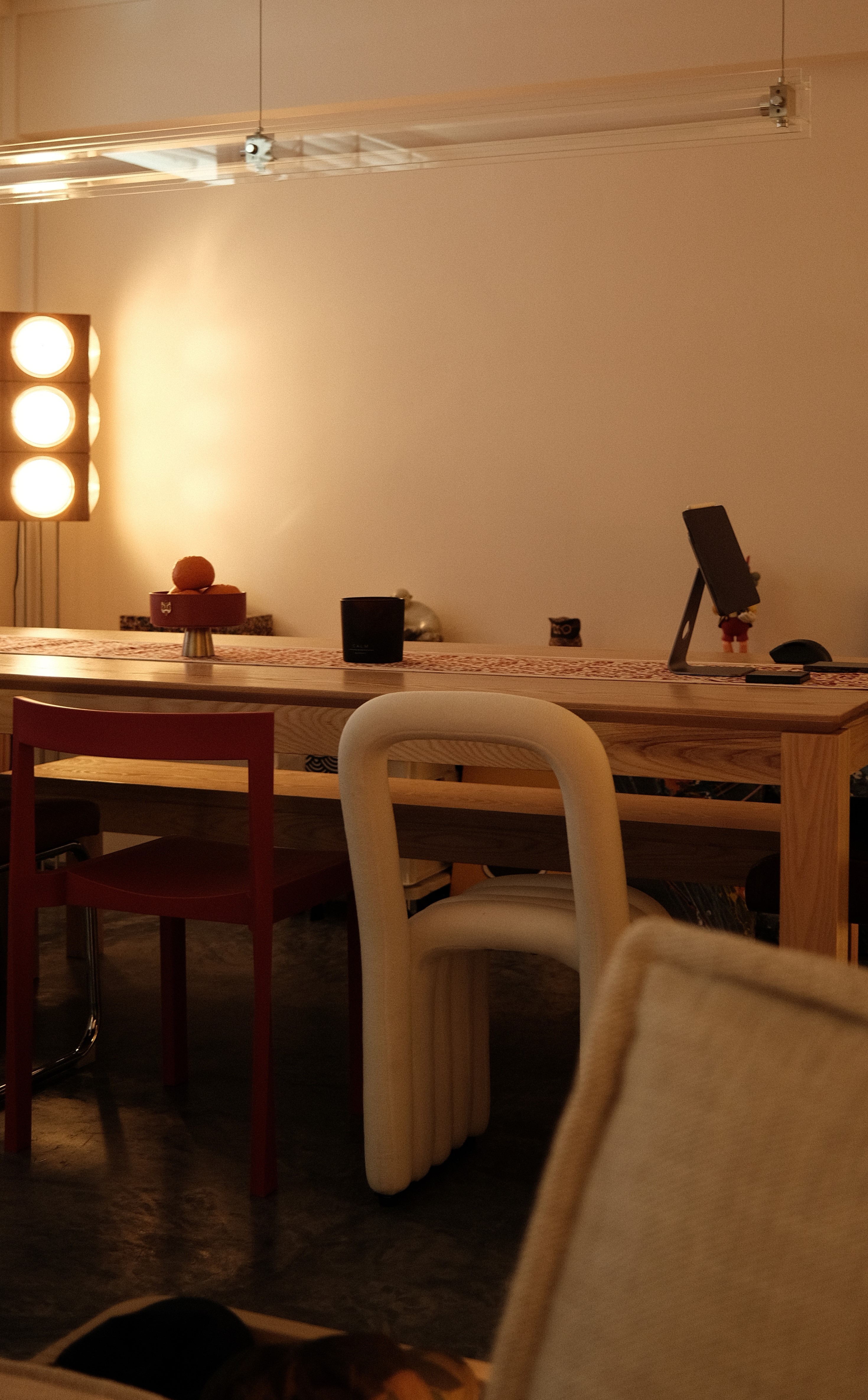 Modern dining area with sculptural chairs, natural wood table, and accent lighting, Persqft Everton Park project