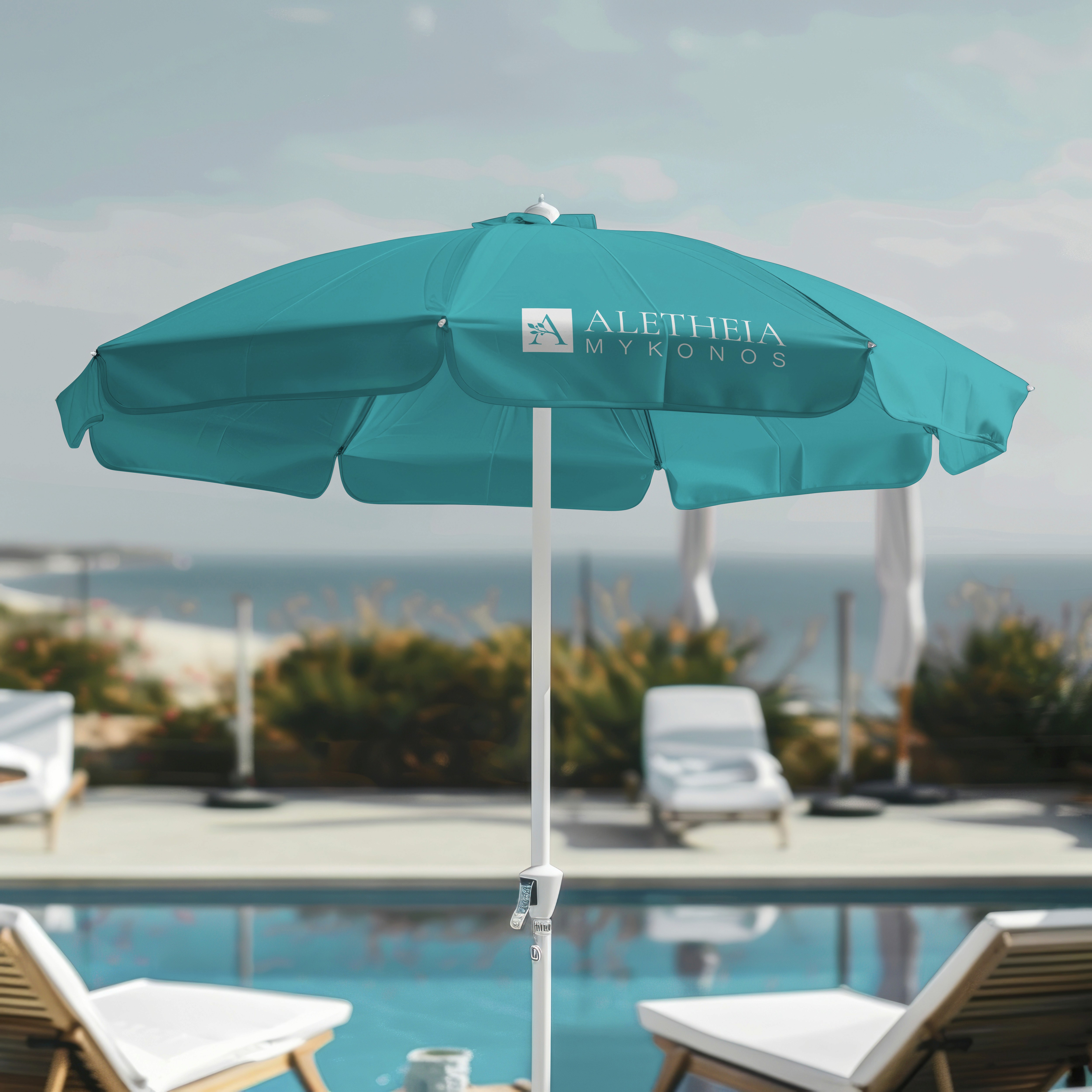 Blue pool umbrella with a white logo for a Greek hotel