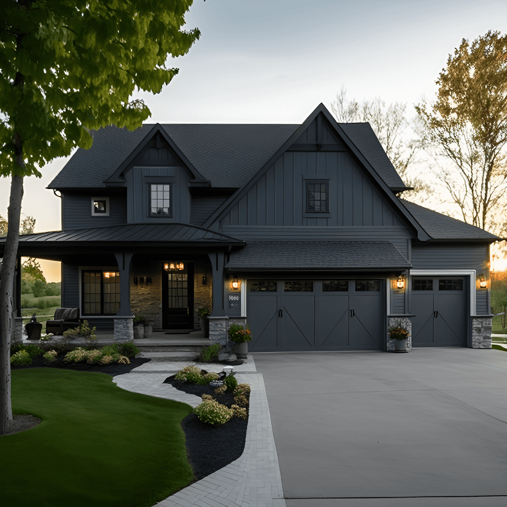 Dark gray farmhouse-style home with stone accents, three-car garage, and curved driveway at dusk