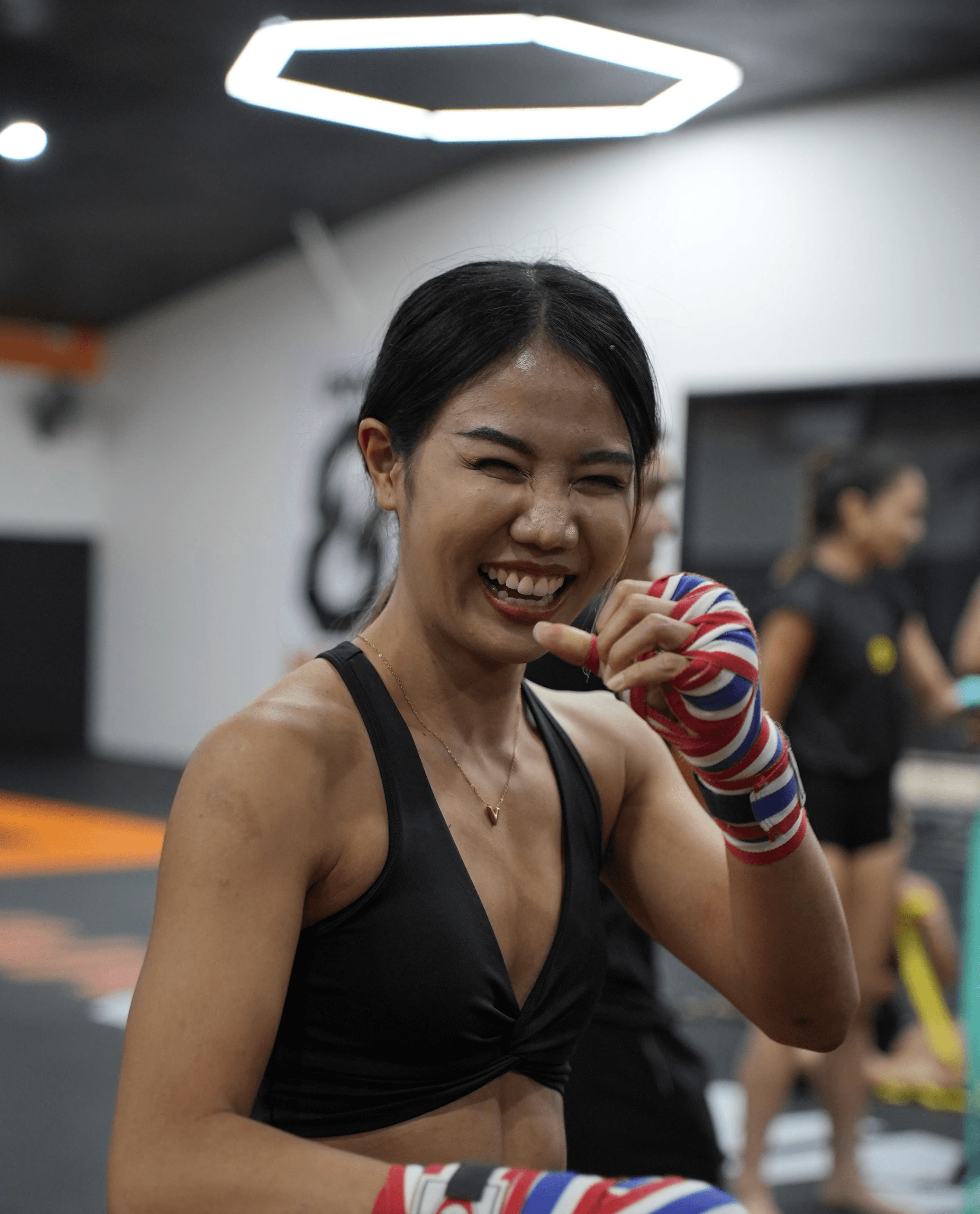 a happy muay thai student