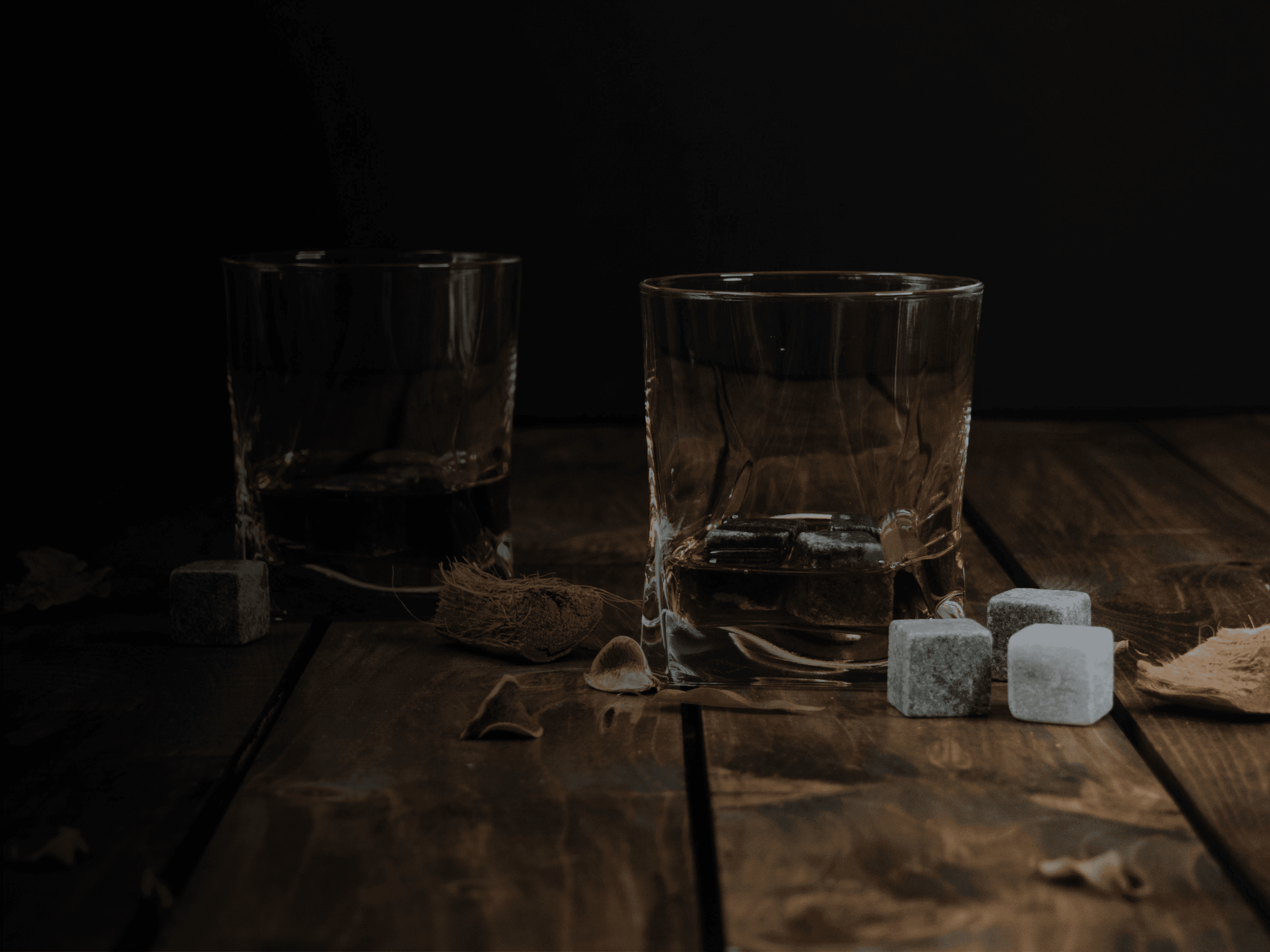 A close-up view of various baked goods on wooden plates, with warm, inviting colors and textures.