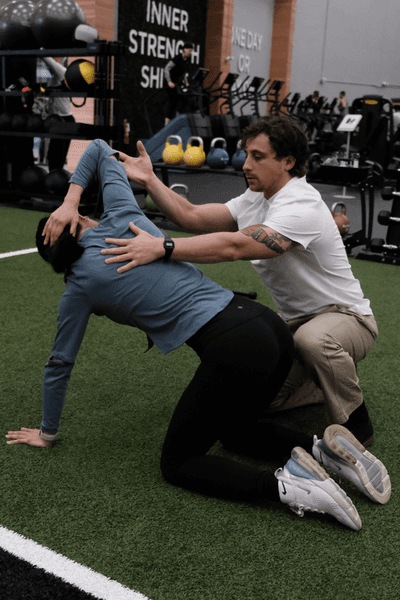 Physiotherapist Justin training a patient on speed ladder 