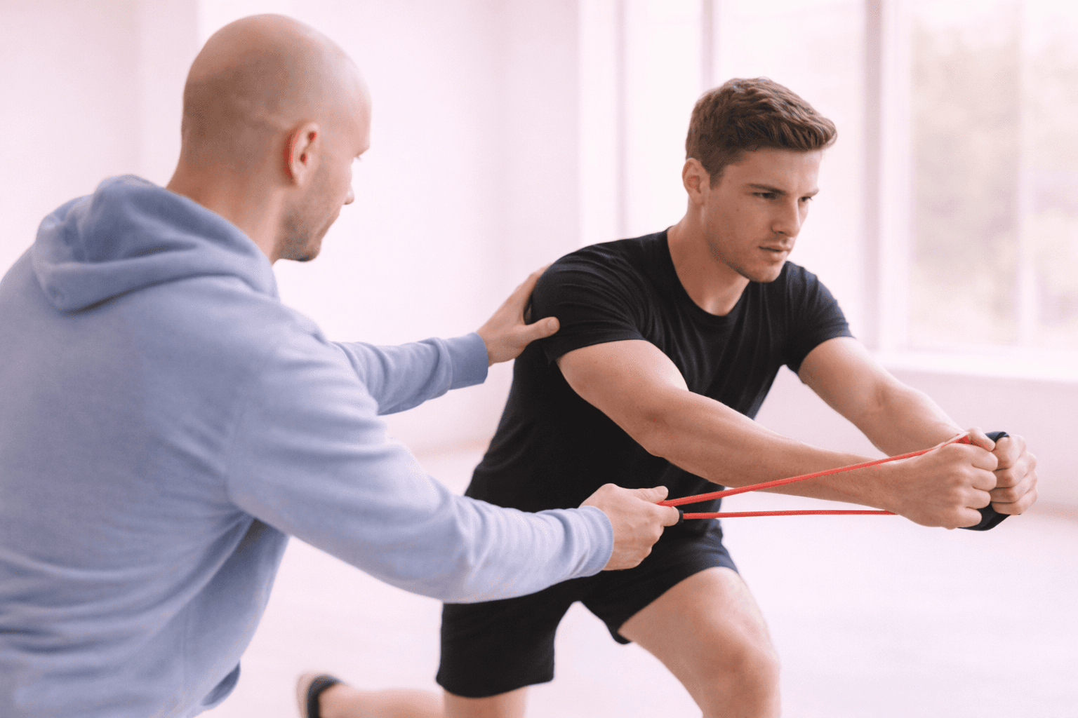 a patient being trained by physical therapist