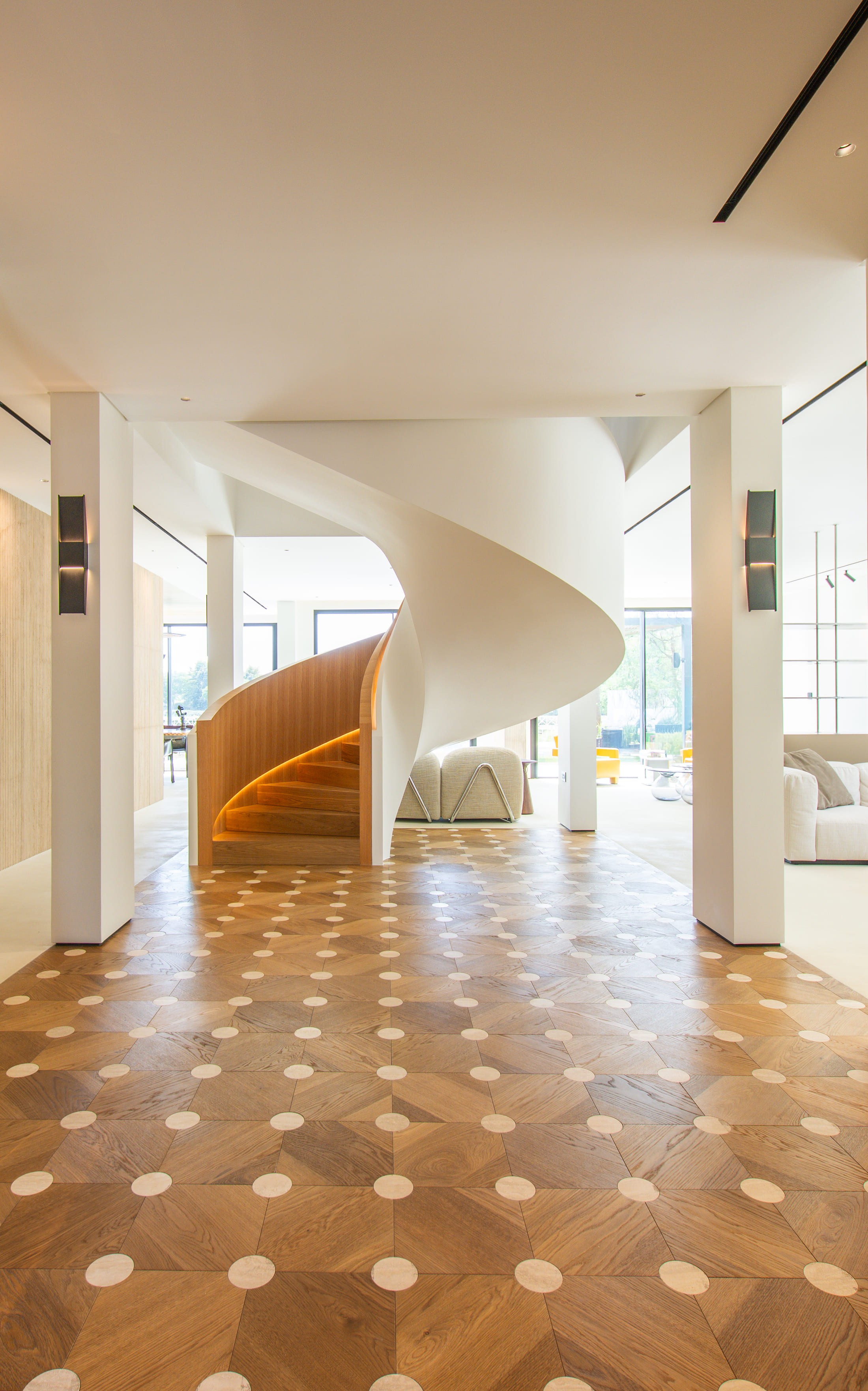 Image of a big window and spiral staircase